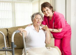 woman and caregiver with walker