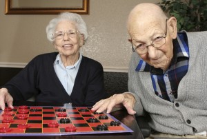 Senior Couple playing checkers