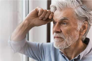 Elderly Man Concerned, with hand on forehead