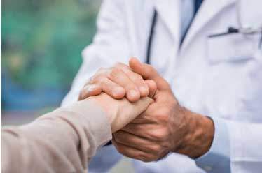 Doctor and Patient holding hands